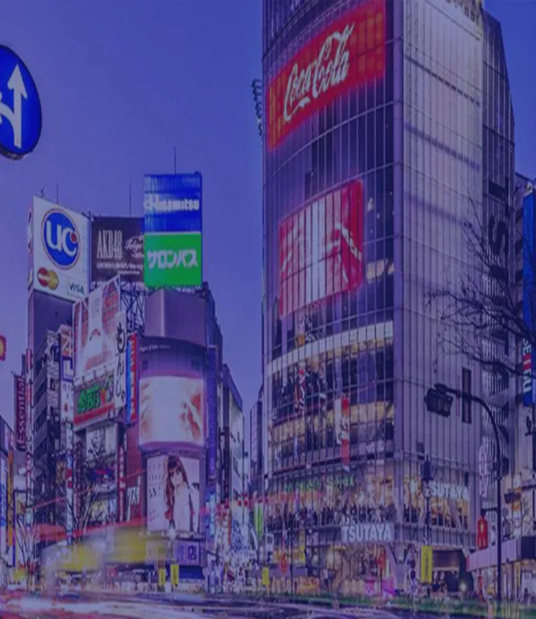 tall building with many advertisements
